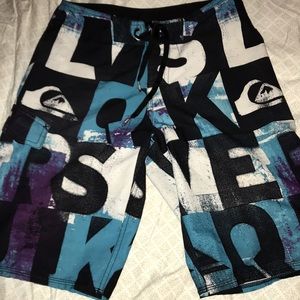 quicksilver swim trunks.
